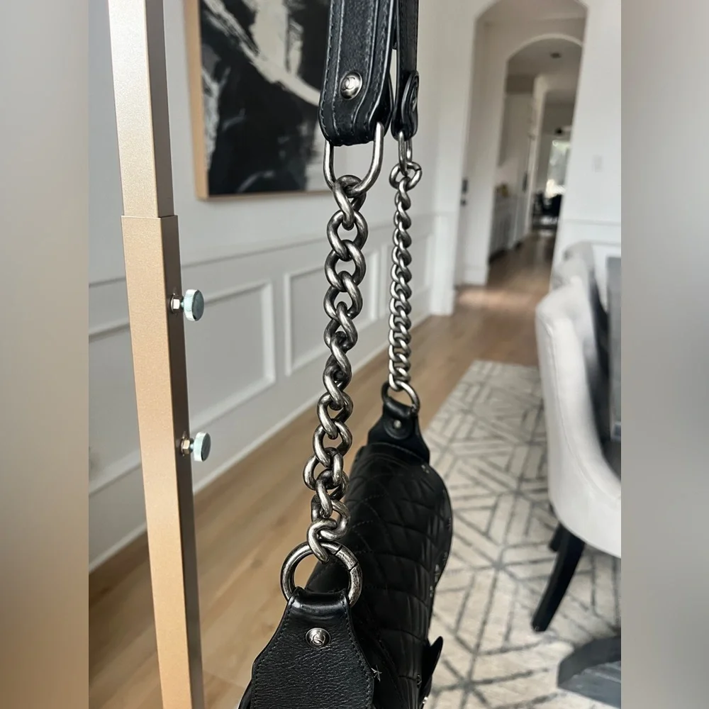 CHANEL Black Quilted & Fur Star-Studded Saddle Bag